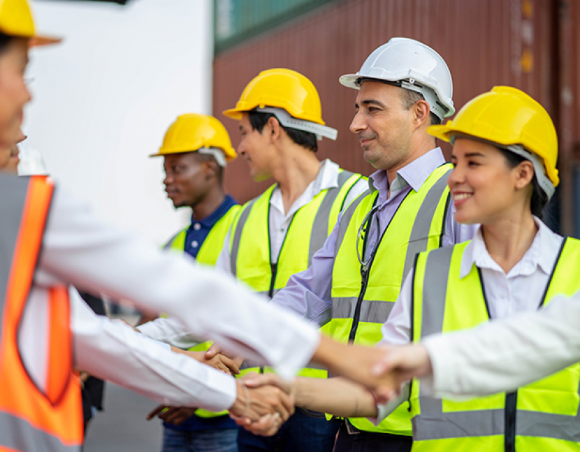 Construction Engineering Team are Handshake Together After Dealing Their Project Successful, Finishing successful meeting.