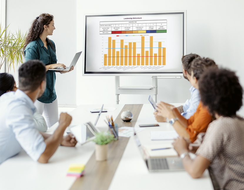 Business meeting and presentation in modern conference room for colleagues