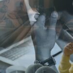 Picture of guy looking depressed in front of laptop - mental health.