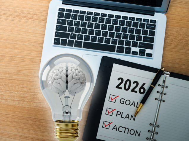 2026 new year resolutions on notepad with coffee and laptop | TeamsynerG Global Consulting